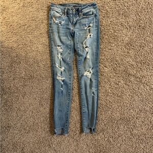 Distressed Super Low Rise Jeggings